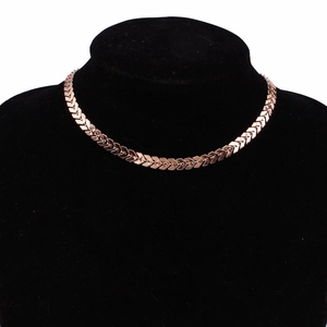 Elegant rose gold herringbone chain necklace displayed on a black neck bust model
