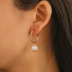 Minimalist gold hoop earrings with elegant wrapped pearl pendant for women fashion