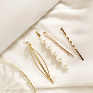 Set de 4 barrettes à cheveux élégantes avec perles et motifs dorés minimalistes