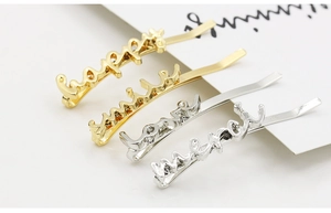 Detailed view of alloy hair pins with cursive Love, Happy, and Smile metal lettering