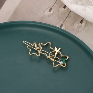 Barrette étoile dorée élégante avec silhouette de fée, perle et strass vert brillant