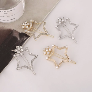 Set de pinces à cheveux étoiles dorées et argentées avec zircons et perles blanches
