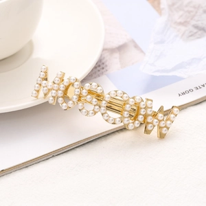 Elegante fermaglio per capelli in oro con design a lettere MOON e perle bianche da donna