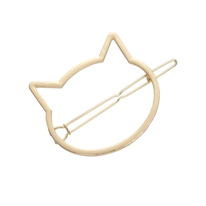 Minimalistische goudkleurige metalen haarklem met een opengewerkt kattenkop design