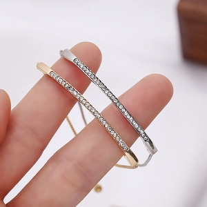 Elegant adjustable crystal tennis bracelet in gold and silver finish for women