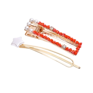 Handmade gold hair clip set with orange beads, white pearls and star charm for women