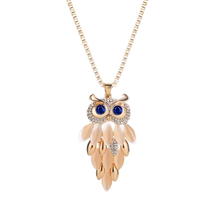 Collana a forma di gufo alla moda con cristalli bianchi, occhi blu e pietre occhio di gatto
