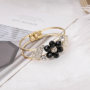 Golden double-layer rhinestone bracelet with black crystal flower and diamond centerpiece