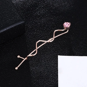 Elegante fermaglio per capelli ondulato oro rosa con uno strass rosa scintillante da donna