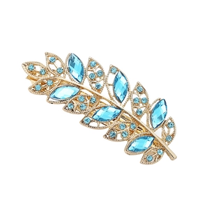 Elegant gold-plated leaf hair clip featuring sparkling blue marquise crystals and stones