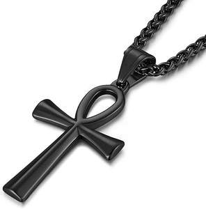 Close-up of black matte Ankh cross pendant with wheat chain on a white background