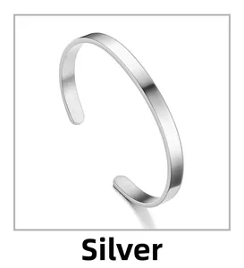 Detailed view of polished silver C-shaped cuff bracelet made of high-grade stainless steel