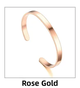Detail view of the rose gold C-shaped titanium steel bracelet with a brushed metal finish
