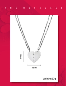 Detailed size view of polished stainless steel heart puzzle necklace for couples