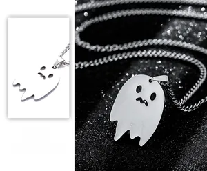 Macro view of ghost pendant in polished stainless steel with customizable engraving