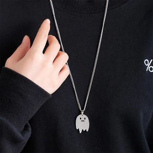 Ghost pendant necklace in silver stainless steel on black sweater for Halloween style