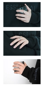 Vues détaillées d'une bague avec lettres évidées en acier titane au design unisexe