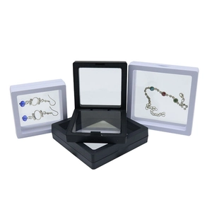 Black and white PE film floating jewelry display boxes with earrings and bracelets