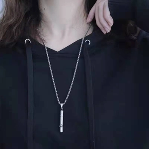 Unisex stainless steel anxiety relief breathing whistle pendant on a long bead chain