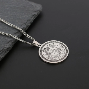 Macro detail of Artemis silver pendant necklace with Greek key pattern on black stone