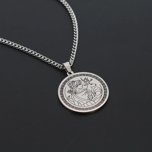 Detail of Artemis hunting goddess engraving on silver stainless steel pendant