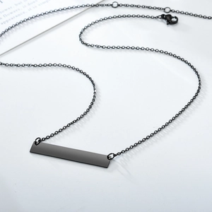 Minimalist black stainless steel vertical bar necklace with a matte finish on cable chain