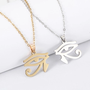Golden and silver Eye of Horus stainless steel necklaces on a clean white background