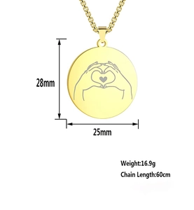 Golden stainless steel necklace showing detailed heart hand gesture pendant size specifications