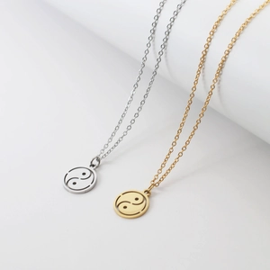 Minimalist Yin Yang pendant necklaces in gold and silver stainless steel for couples