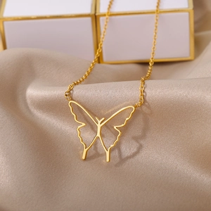 Elegant gold stainless steel necklace with minimalist hollow butterfly pendant on silk