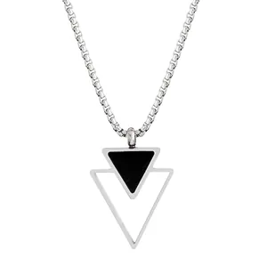 Detail of a geometric double triangle pendant with black enamel on a silver box chain