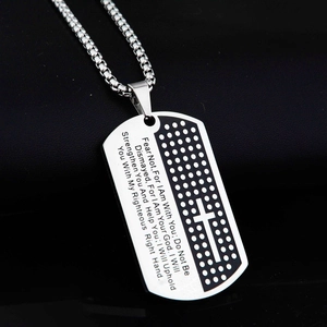 Detail of stainless steel dog tag pendant with engraved Bible verse and cross on pearl chain