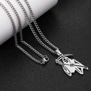 Detailed view of the Grim Reaper pendant with scythe on a polished stainless steel chain