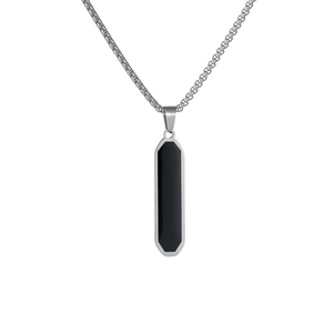 Close-up of minimalist silver stainless steel necklace with black rectangular bar pendant