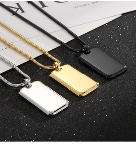 Three mirror polished stainless steel military dog tag necklaces in silver gold and black