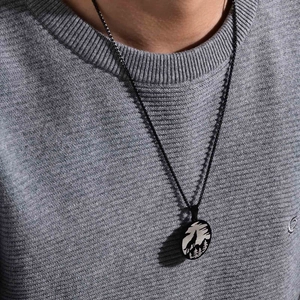 Men's vintage stainless steel necklace with a hollow forest and wild wolf pendant