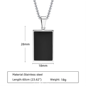 Detail view of rectangular stainless steel dog tag necklace with dimensions 28mm by 18mm