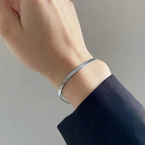 Minimalist silver stainless steel snake chain bracelet for men and women on wrist