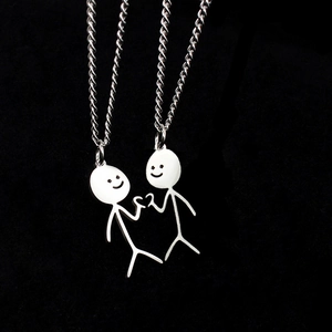 Funny stickman couple necklaces with heart forming hand gesture in silver stainless steel