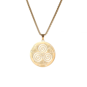 Detail of golden Celtic Triskele pendant with intricate knotwork on a box chain necklace