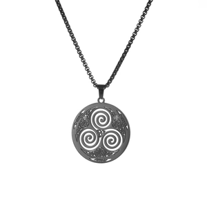 Detail view of black Celtic Triskele pendant necklace with intricate braided texture