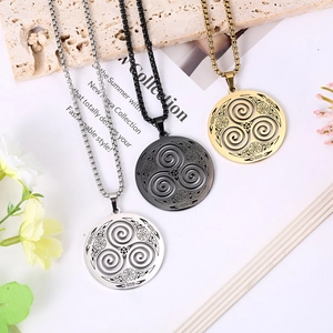 Set of three Celtic Triskele knot necklaces in gold, silver, and black stainless steel finish