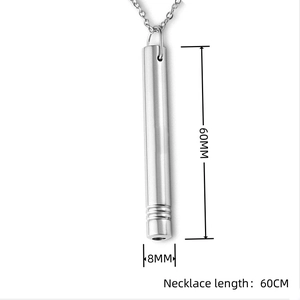 Detailed view of cylindrical mindfulness breathing whistle pendant with 60mm height size