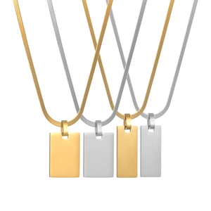 Detailed view of rectangular stainless steel pendants with snake chains in gold and silver