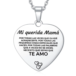 Close-up of heart pendant with Spanish laser engraving and small heart details