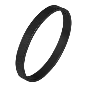 Close-up of black matte open bangle with minimalist engraved Roman numerals