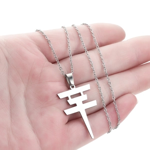 Minimalist stainless steel necklace featuring a Ping character pendant on a slim chain