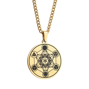 Macro view of gold stainless steel necklace showing detailed Metatron's Cube engraving
