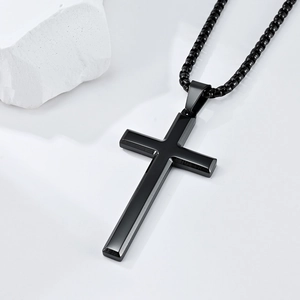Minimalist black stainless steel cross pendant necklace with classic beveled edges
