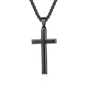Macro shot of matte black stainless steel cross pendant with a box chain